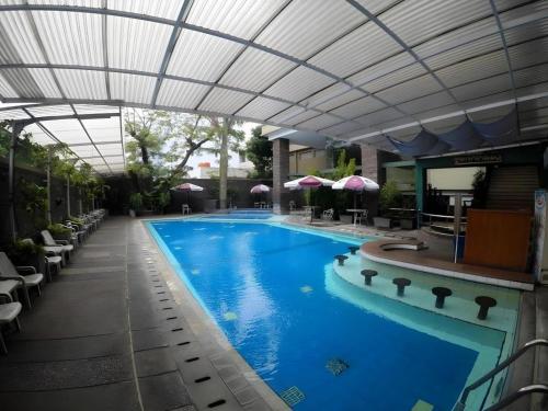 Πισίνα στο ή κοντά στο Kedaton Hotel