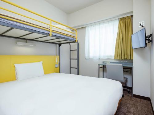 Postel nebo postele na pokoji v ubytování Comfort Inn Suwa Inter