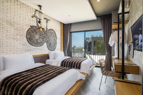 Ένα ή περισσότερα κρεβάτια σε δωμάτιο στο Wheeler Bed &Bike