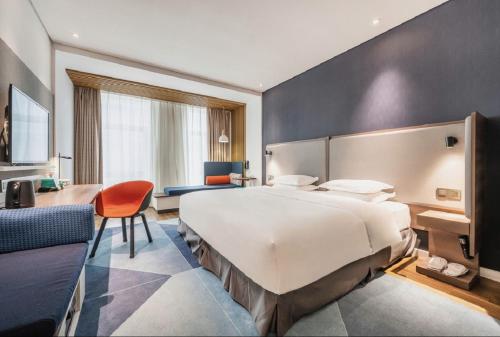 Ένα ή περισσότερα κρεβάτια σε δωμάτιο στο Holiday Inn Express Hefei Shushan by IHG