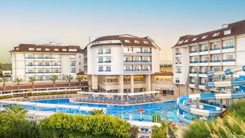 an image of a resort with a water slide at Ramada Resort Side in Side