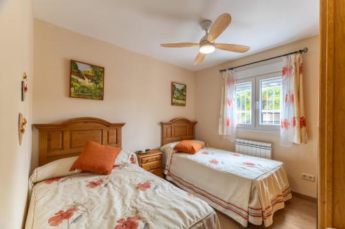 Postel nebo postele na pokoji v ubytování Casita San Martín