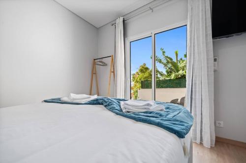 Postel nebo postele na pokoji v ubytování Atlantic View Studio