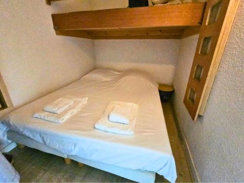 En eller flere senge i et værelse på Arlo - proche plage du Penon