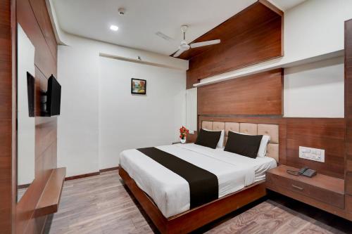 Ένα ή περισσότερα κρεβάτια σε δωμάτιο στο Collection O Motipura Bus Terminal Formerly Hotel Navjivan