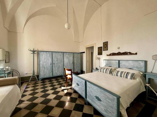 Ένα ή περισσότερα κρεβάτια σε δωμάτιο στο Casina Grassi In Salento