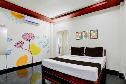 Postel nebo postele na pokoji v ubytování Collection O Chirala Beach View Formerly Sea Shell Resort