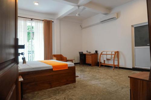 Giường trong phòng chung tại Grand Castellea Resort