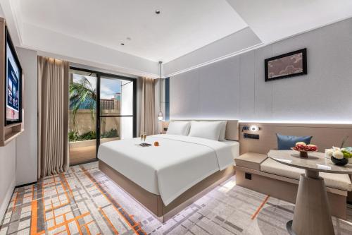 Ένα ή περισσότερα κρεβάτια σε δωμάτιο στο Broadcasting & Television Hotel