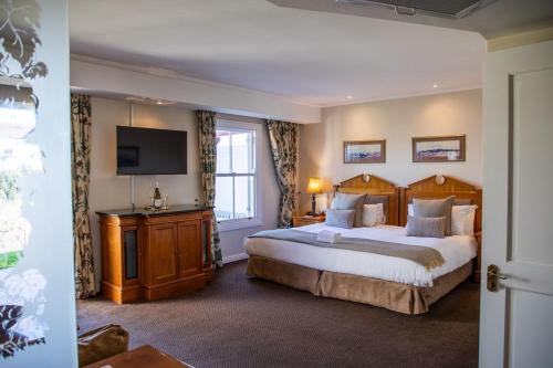 Voodi või voodid majutusasutuse Zevenwacht Country Inn toas