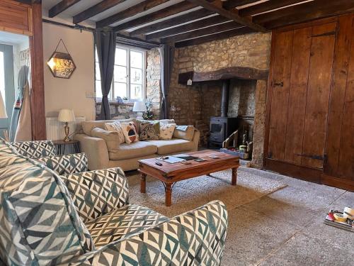 Et opholdsområde på Rustic Cottage in the countryside