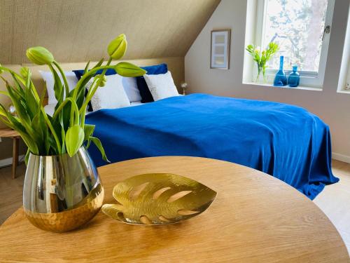 Giường trong phòng chung tại MAISON ART Appartements - Objekt 94080