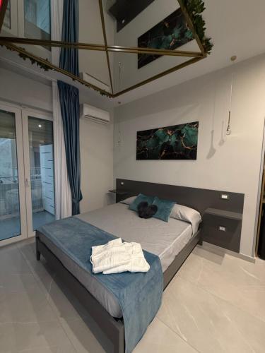 Postel nebo postele na pokoji v ubytování Ladi House