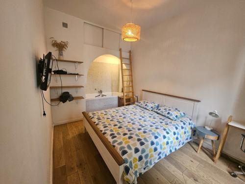 Postel nebo postele na pokoji v ubytování appartement aux portes de Paris