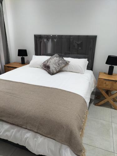 Postel nebo postele na pokoji v ubytování Atloch