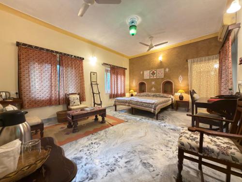 Ένα ή περισσότερα κρεβάτια σε δωμάτιο στο Korta Escape- A Heritage Resort in Jawai