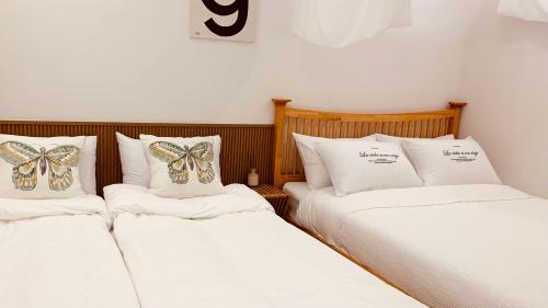 Postel nebo postele na pokoji v ubytování Im Youngchon