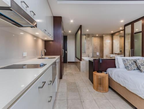 Kuchyň nebo kuchyňský kout v ubytování Coastal Bliss Studio - Santai 224