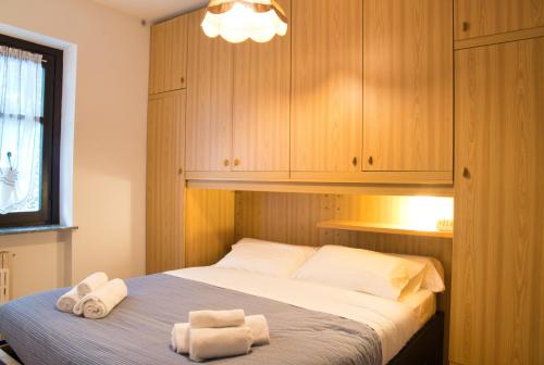 Voodi või voodid majutusasutuse Nido tra i Pini in Cassina Valsassina toas