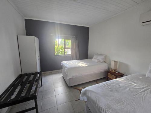 Ένα ή περισσότερα κρεβάτια σε δωμάτιο στο Villa Graf