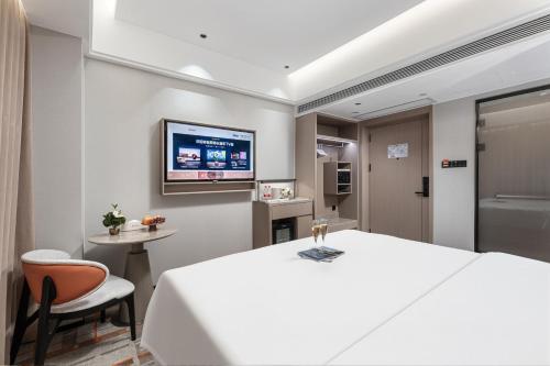 Kuchyň nebo kuchyňský kout v ubytování From K Guangshi Hotel-XIAOBEI Metro Branch