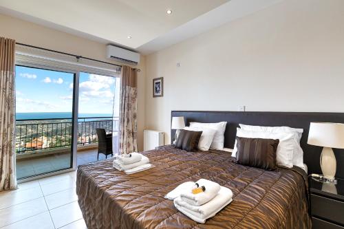 Postel nebo postele na pokoji v ubytování Hill View Hotel Apartments