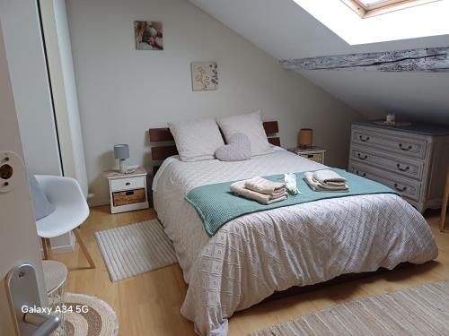 Ένα ή περισσότερα κρεβάτια σε δωμάτιο στο L'étoile du matin