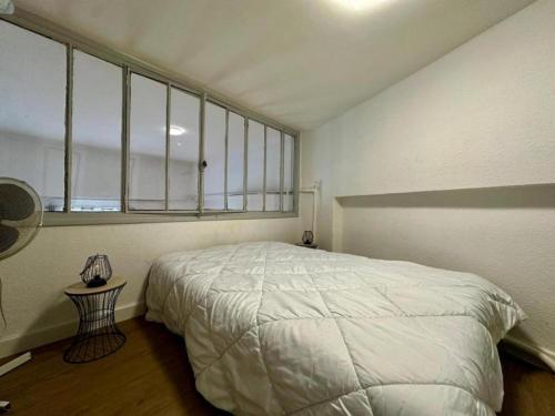 En eller flere senge i et værelse på Duplex république