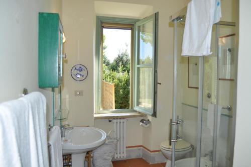 Koupelna v ubytování Apartment I Fontanili