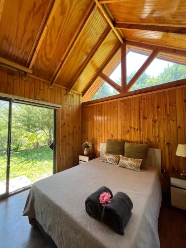 Postel nebo postele na pokoji v ubytování Cabaña cajón del maipo chercán