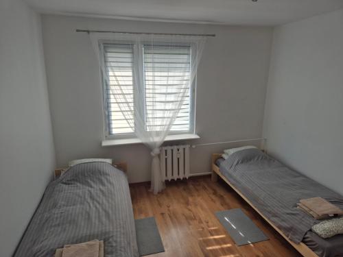 Postel nebo postele na pokoji v ubytování Nati