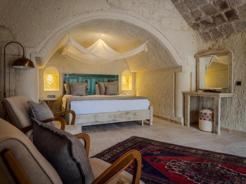 Postel nebo postele na pokoji v ubytování Zemi Hotel Cappadocia