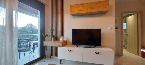 Μια τηλεόραση ή/και κέντρο ψυχαγωγίας στο Matin's cozy nest