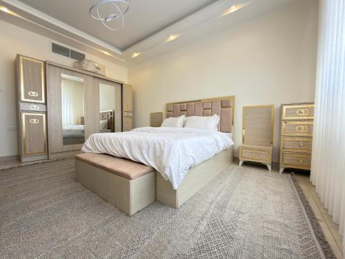 Ένα ή περισσότερα κρεβάτια σε δωμάτιο στο Luxury Stay