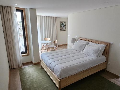 Postel nebo postele na pokoji v ubytování Maragoça AL