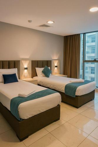 Ένα ή περισσότερα κρεβάτια σε δωμάτιο στο al AMER palace hotel by al Jamal