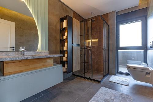 Koupelna v ubytování Arya Garden Villas Side