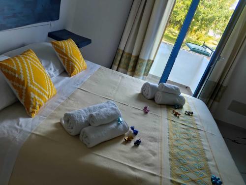 Turchese House Bed and Breakfast客房内的一张或多张床位