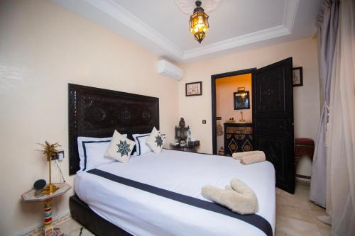 Cama o camas de una habitación en Riad Ta'achchaqa