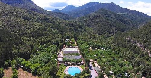an aerial view of a resort in the mountains at TAIGA Bassegoda Park in Albanya