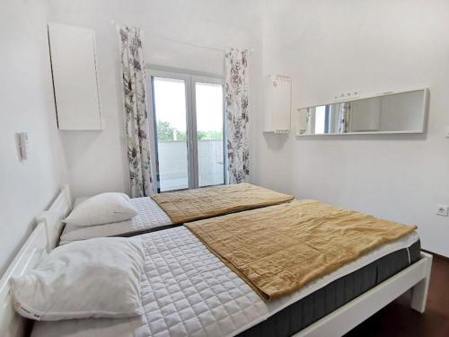 Ένα ή περισσότερα κρεβάτια σε δωμάτιο στο Two-storey house with pool in trika