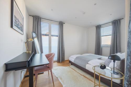 Postel nebo postele na pokoji v ubytování Luxury City Penthouse Villach