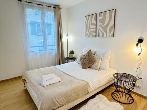 Postel nebo postele na pokoji v ubytování Maison Le A, à 2 pas de Disneyland