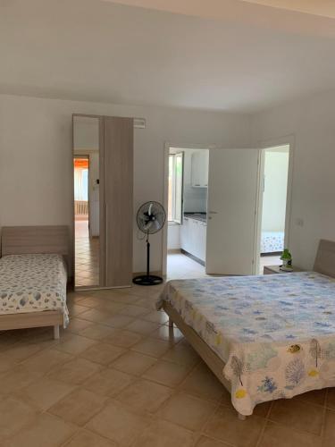 Foto Shell House, Casa con ampio giardino a 100m dal mare 2