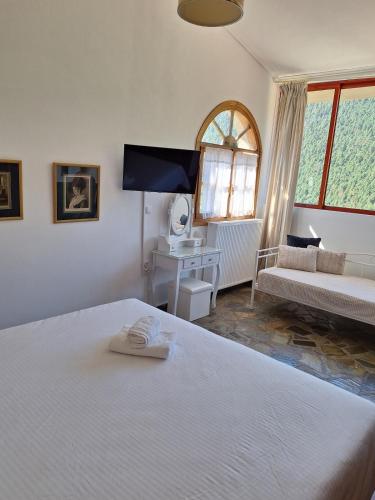 Giường trong phòng chung tại Villa Christina