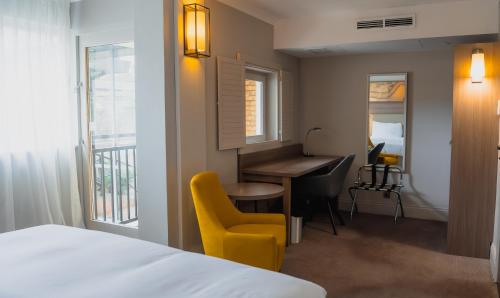 Ένα ή περισσότερα κρεβάτια σε δωμάτιο στο a&o London Docklands Riverside