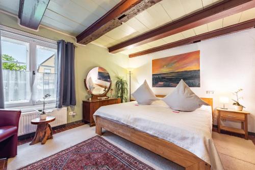 Postel nebo postele na pokoji v ubytování Ferienwohnung Timmermann 2