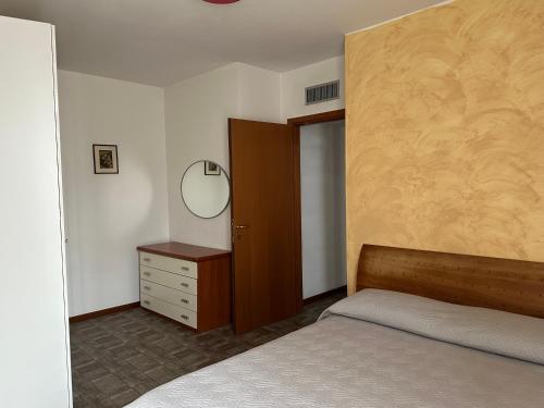 En eller flere senge i et værelse på Intero appartamento Parma Fiere