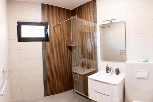 Koupelna v ubytování Căsuța Lizucăi