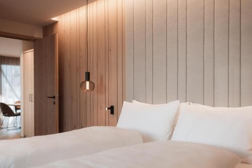 Postel nebo postele na pokoji v ubytování Mountain Residence CLARA